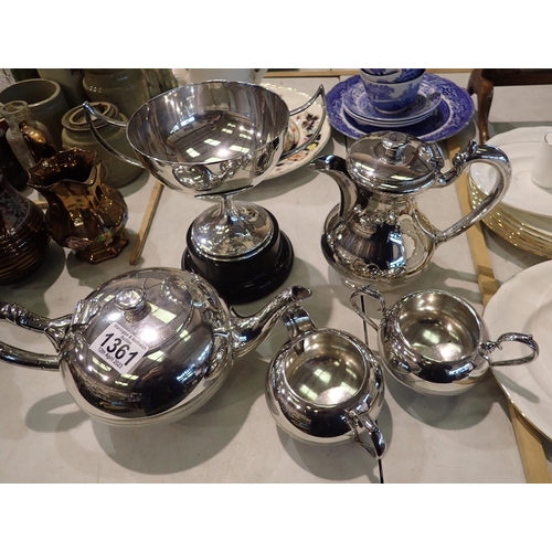 1361 - Walker & Hall four piece silver plated tea service and a silver plated twin handled trophy. P&P Grou... 