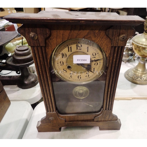 1380 - Oak cased chiming mantel clock with pendulum. Not available for in-house P&P