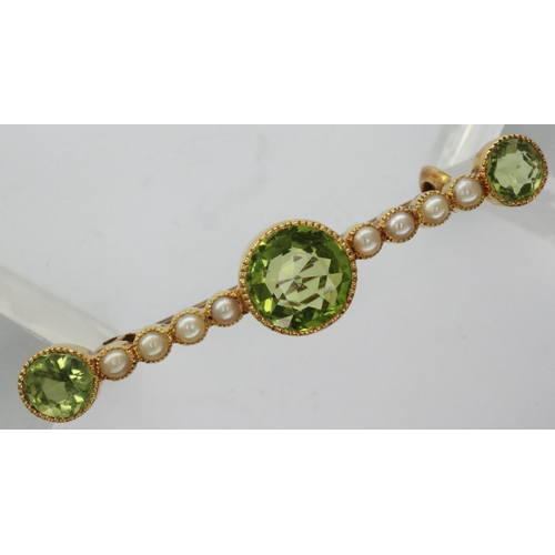 10 - 15ct gold brooch set with seed pearls and emeralds, L: 40 mm, 2.2g. P&P Group 1 (£14+VAT for the fir... 