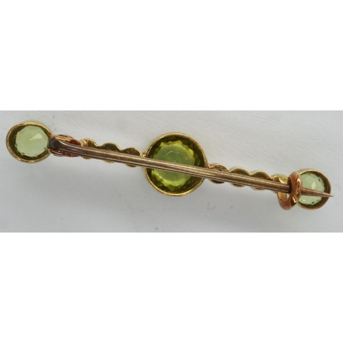 10 - 15ct gold brooch set with seed pearls and emeralds, L: 40 mm, 2.2g. P&P Group 1 (£14+VAT for the fir... 