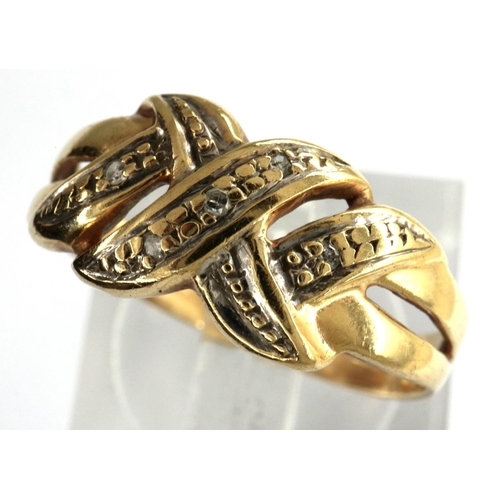 29 - 9ct gold crossover ring set with diamonds, size K/L, 1.9g. P&P Group 1 (£14+VAT for the first lot an... 