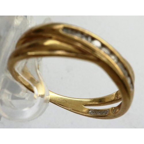 35 - 9ct gold diamond crossover ring, size N, 2.4g. P&P Group 1 (£14+VAT for the first lot and £1+VAT for... 