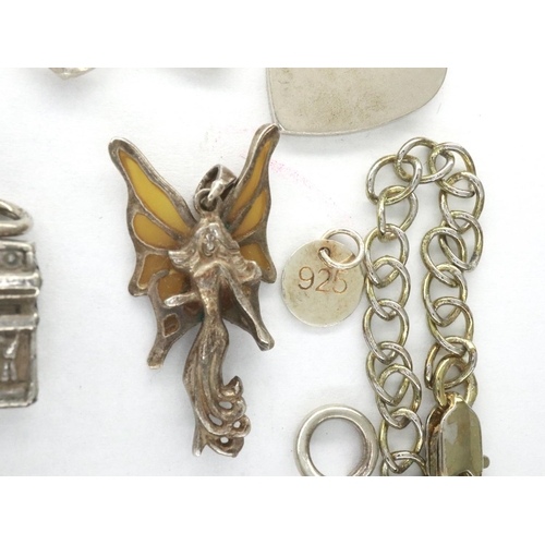 38 - Mixed 925 silver to include thirteen charms and two chains. P&P Group 1 (£14+VAT for the first lot a... 