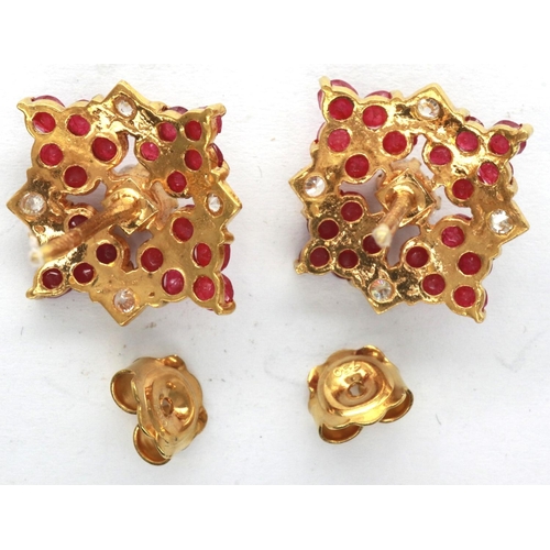 52 - Pair of 18ct gold ruby and cubic zirconia set stud earrings, 5.6g. P&P Group 1 (£14+VAT for the firs... 