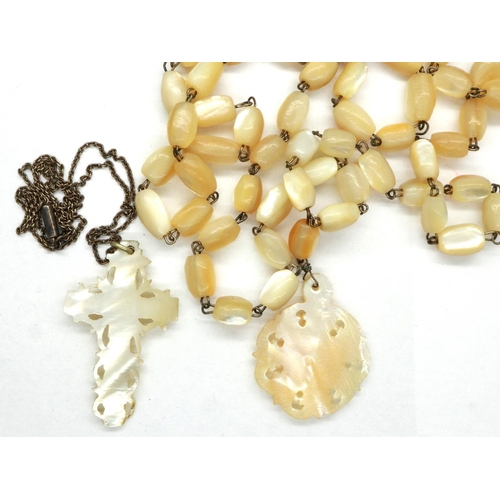 61 - Two mother of pearl pendant necklaces, one on mother of pearl beads, the other on a 925 silver chain... 