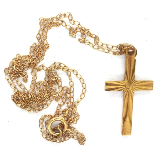 67 - 9ct gold cross pendant on a 9ct gold chain, chain L: 46 cm, combined 1.1g. P&P Group 1 (£14+VAT for ... 