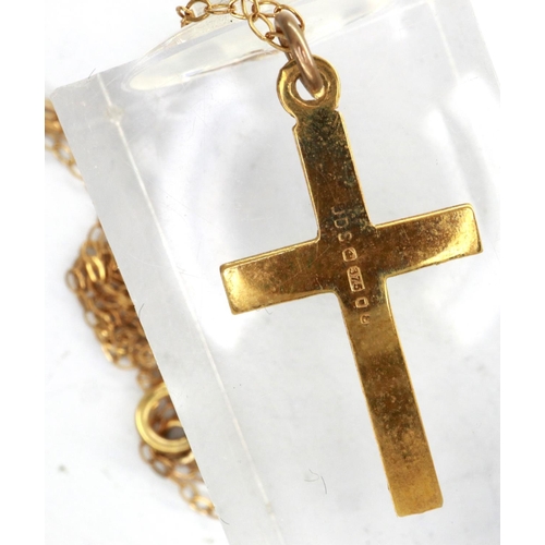 67 - 9ct gold cross pendant on a 9ct gold chain, chain L: 46 cm, combined 1.1g. P&P Group 1 (£14+VAT for ... 