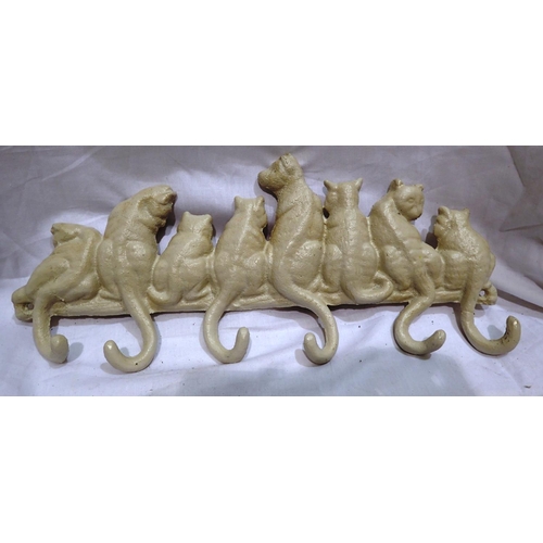 1422 - Cast iron cat tail coat hook, W: 30 cm. P&P Group 1 (£14+VAT for the first lot and £1+VAT for subseq... 