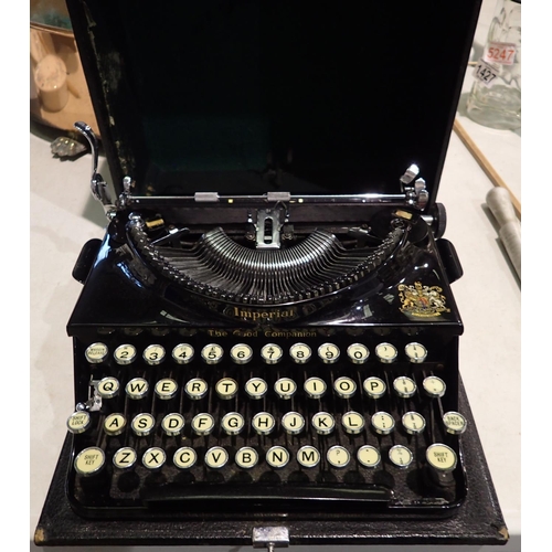 1429 - Cased Imperial mechanical typewriter. Not available for in-house P&P