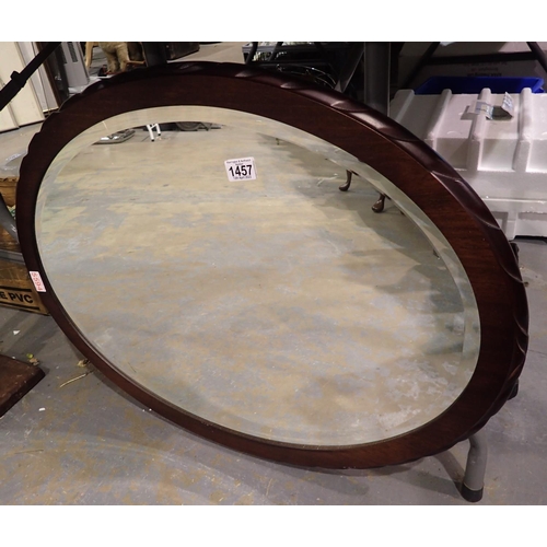 1457 - Large oval mahogany framed mirror, 70 x 40 cm. Not available for in-house P&P