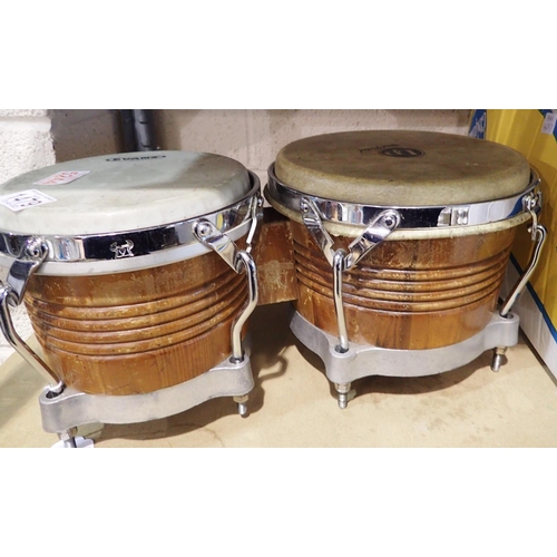 1479 - Pair of Bongo drums/Evans and LP. Not available for in-house P&P