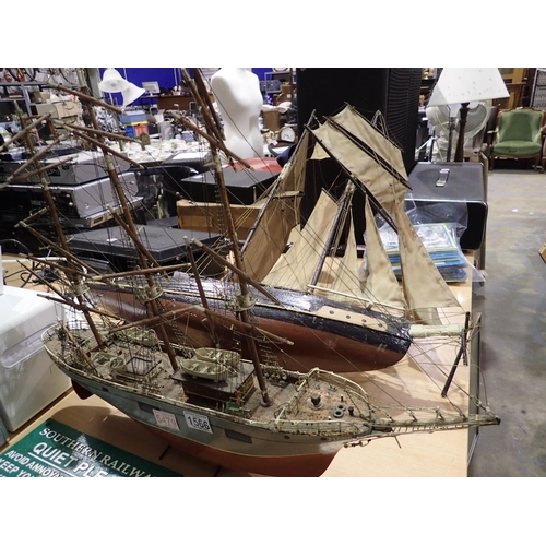 1566 - Two model ships on stands, largest H: 85 cm. Not available for in-house P&P