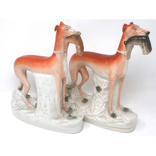 248 - Pair of 19th century Staffordshire greyhound dogs, H: 28 cm, cracks to both bases and bodies, age ma... 