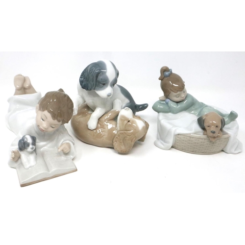 258 - Three Nao figurines, H: 14 cm, small mark to one dogs body. P&P Group 2 (£18+VAT for the first lot a... 