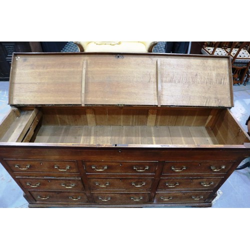 2121 - An early 19th century Lancashire chest, with lifting top above six drawers and raised on bracket fee... 