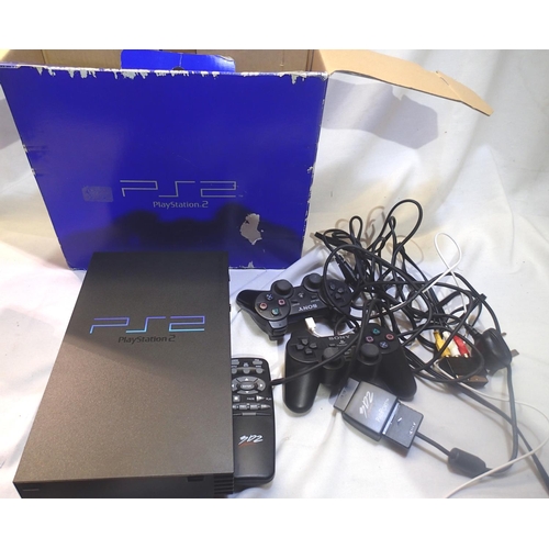 2467 - Sony PlayStation 2, console, remote, two controllers, leads and paperwork. P&P Group 1 (£14+VAT for ... 