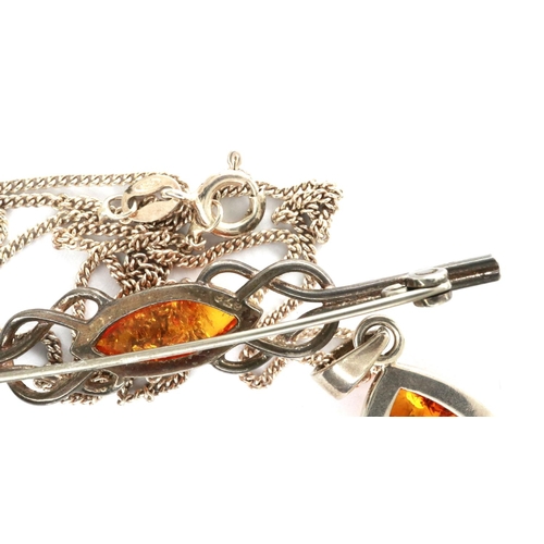 12 - 925 silver and amber pendant necklace and brooch set, boxed, chain L: 40 cm. P&P Group 1 (£14+VAT fo... 