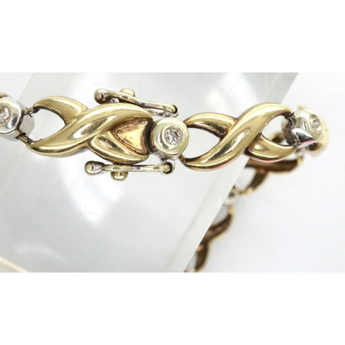 27 - 9ct gold diamond bracelet set with fifteen diamonds, L: 16 cm, 6.1g. P&P Group 1 (£14+VAT for the fi... 