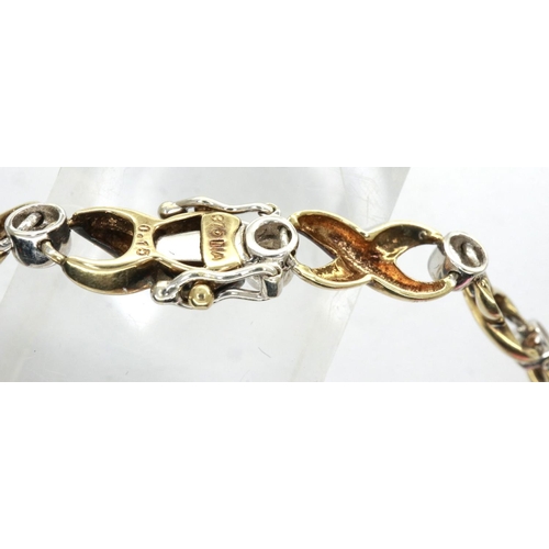 27 - 9ct gold diamond bracelet set with fifteen diamonds, L: 16 cm, 6.1g. P&P Group 1 (£14+VAT for the fi... 