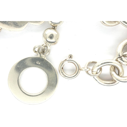 63 - Two 925 silver bracelets, including a T-bar clasp example, longest L: 20 cm. P&P Group 1 (£14+VAT fo... 