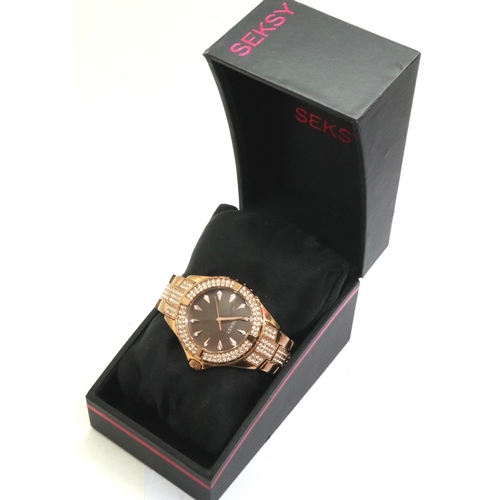 90 - SEKSY: ladies wristwatch on a gilt stainless steel bracelet, boxed, working at lotting. P&P Group 1 ... 