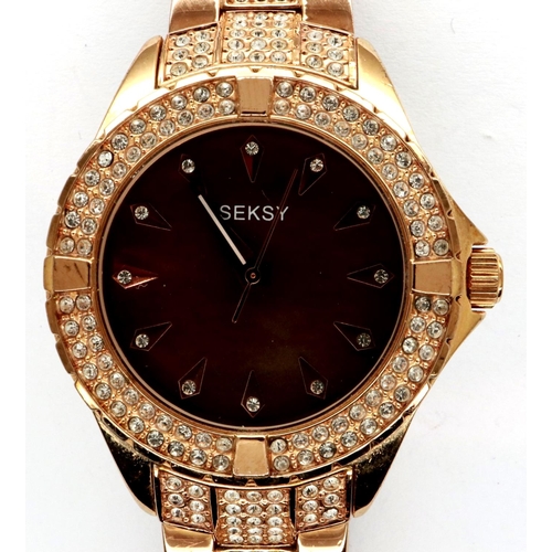 90 - SEKSY: ladies wristwatch on a gilt stainless steel bracelet, boxed, working at lotting. P&P Group 1 ... 