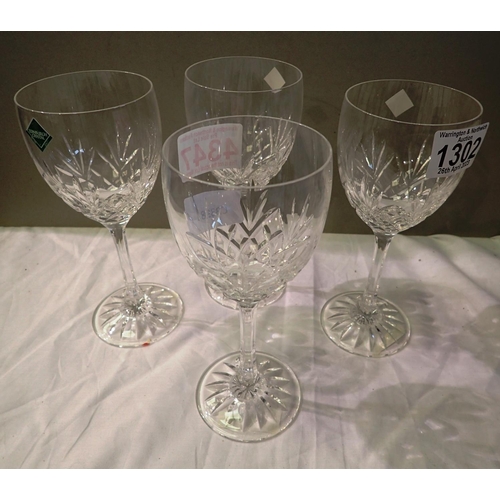 1302 - Four Edinburgh Crystal wine glasses. P&P Group 2 (£18+VAT for the first lot and £3+VAT for subsequen... 