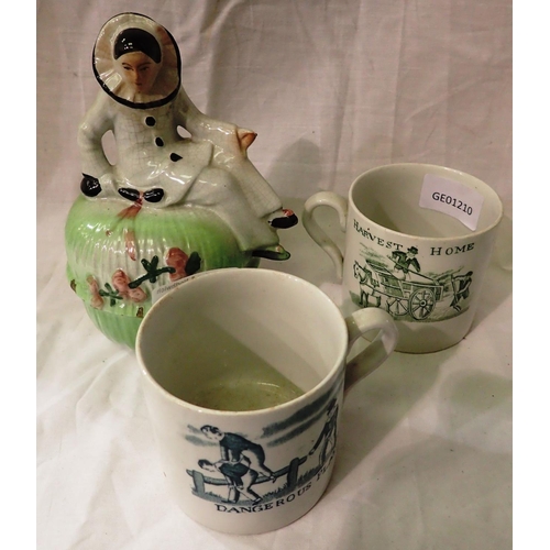 1315 - Two 19th century transfer decorated motto cups and a Pierrot figural pot, largest H: 18 cm, (3). P&P... 