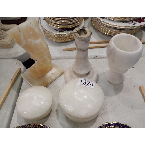 1374 - Three onyx pots and a candlestick. P&P Group 2 (£18+VAT for the first lot and £3+VAT for subsequent ... 