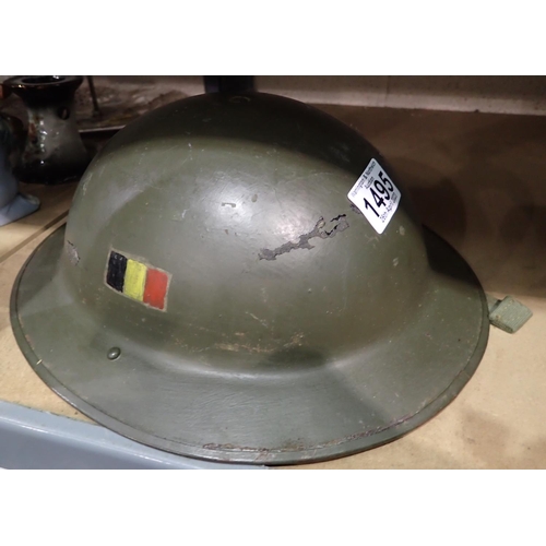 1495 - Post war helmet dated 1952, with painted Belgian flag on one side. P&P Group 2 (£18+VAT for the firs... 