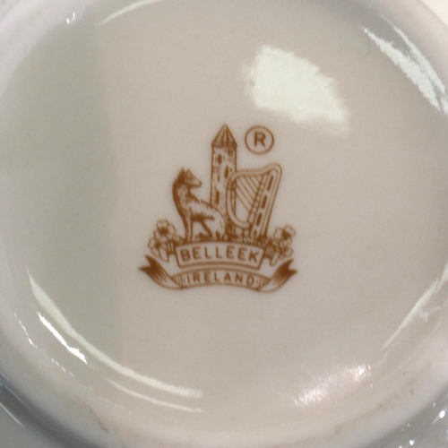 177 - Thirteen pieces of mixed Belleek, largest H: 33 cm, some with damages. P&P Group 3 (£25+VAT for the ... 