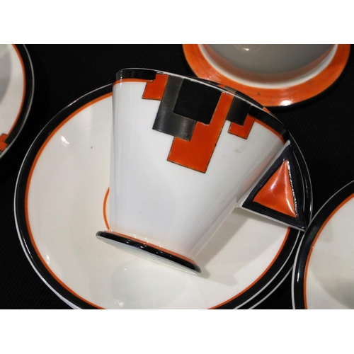 192 - Shelley coffee service of twelve pieces, in the Orange Blocks pattern, number 11786, crack to base o... 