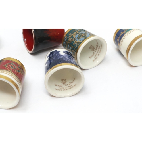 216 - Eleven Royal Doulton ceramic thimbles. P&P Group 1 (£14+VAT for the first lot and £1+VAT for subsequ... 