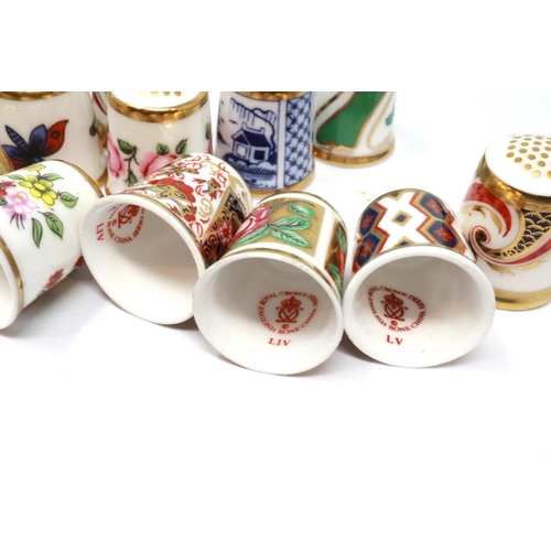 256 - Fifteen Royal Crown Derby ceramic thimbles. P&P Group 2 (£18+VAT for the first lot and £3+VAT for su... 