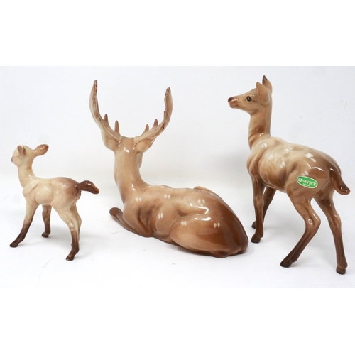 261 - Beswick stag, deer and fawn, largest H: 15 cm, no cracks or chips (3). P&P Group 2 (£18+VAT for the ... 