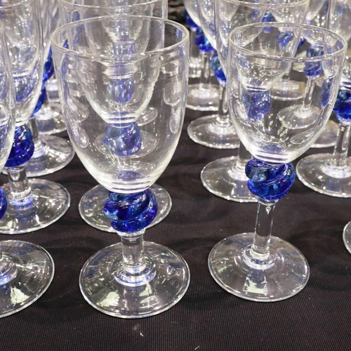 275 - Set of thirty eight hand blown wine glasses with blue twisted knot stems, largest H: 23 cm, all sign... 