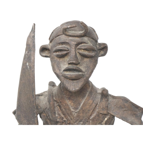 283 - Bronze Tribal warrior statue with sword and spear, H: 43 cm. P&P Group 3 (£25+VAT for the first lot ... 