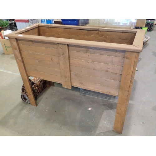 1999 - Large wooden elevated planter, 107 x 97 x 52 cm, and a small bird feeder. Not available for in-house... 