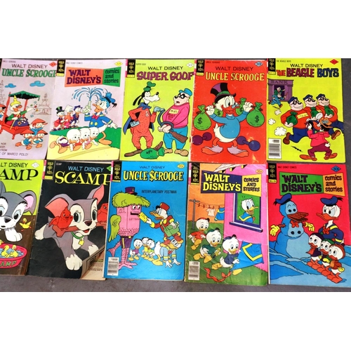 416 - Walt Disneys comics and stories, 12, including Uncle Scrooge, Mickey Mouse etc. P&P Group 1 (£14+VAT... 