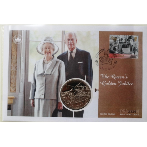 420 - The Golden Jubilee stamp and cover collection, two folders, the first containing sixteen coin covers... 