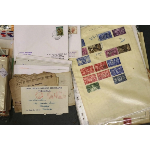 423 - Two stamp albums containing British and worldwide stamps together with a quantity of loose stamps an... 