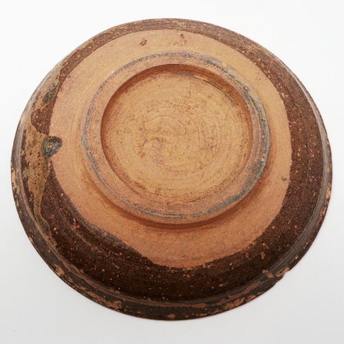 298A - A Song Dynasty terracotta shallow circular dish, having a multi-tonal glaze, D: 13 cm, H: 3 cm. Shal... 