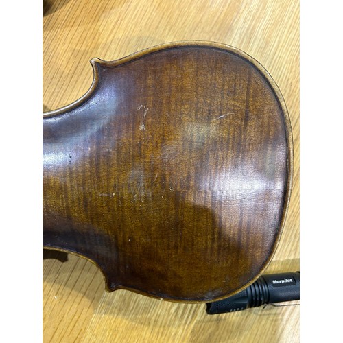 384 - 18th century violin with two piece back, bearing label for Curlo Bergouz Anno 1739, in distressed co... 