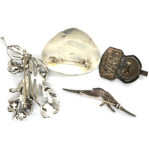 73 - Four 925 and hallmarked silver brooches to include stone set examples. P&P Group 1 (£14+VAT for the ... 