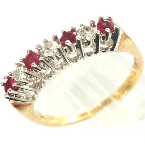 79 - 9ct gold ruby and diamond half eternity ring in a white gold claw setting, size N/O, 2.4g. P&P Group... 