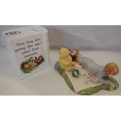 1264 - Two Winnie The Pooh ceramics, largest H: 10 cm. P&P Group 2 (£18+VAT for the first lot and £3+VAT fo... 