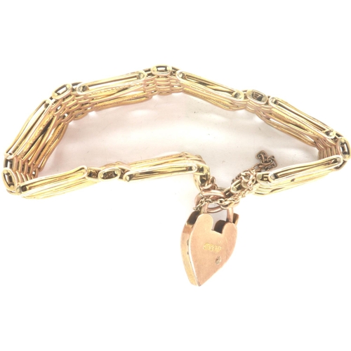 12 - 9ct gold gate bracelet with padlock clasp and safety chain, L: 20 cm, 27.1g. P&P Group 1 (£14+VAT fo... 