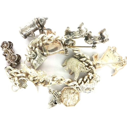 3 - 925 silver charm bracelet with nine charms, padlock clasp and safety chain, together with two dog fo... 