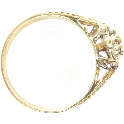 31 - 9ct gold daisy ring set with diamonds, size K, 1.8g. P&P Group 1 (£14+VAT for the first lot and £1+V... 