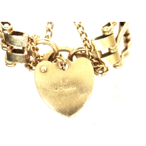 8 - 9ct gold gate bracelet with padlock clasp and safety chain, L: 18 cm, 8.6g. P&P Group 1 (£14+VAT for... 